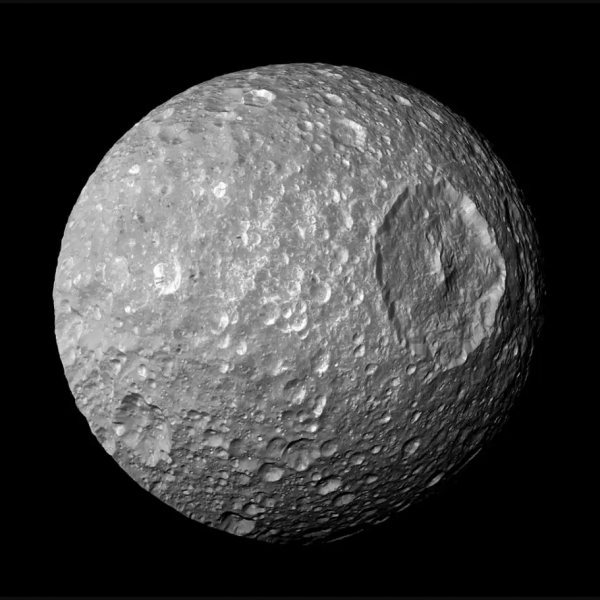 Saturn’s moon Mimas may be hiding a vast global ocean under its ice