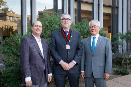 David Fike, Chair; Bill McKinnon, and Dean Feng Sheng Hu at McKinnon's installation ceremony